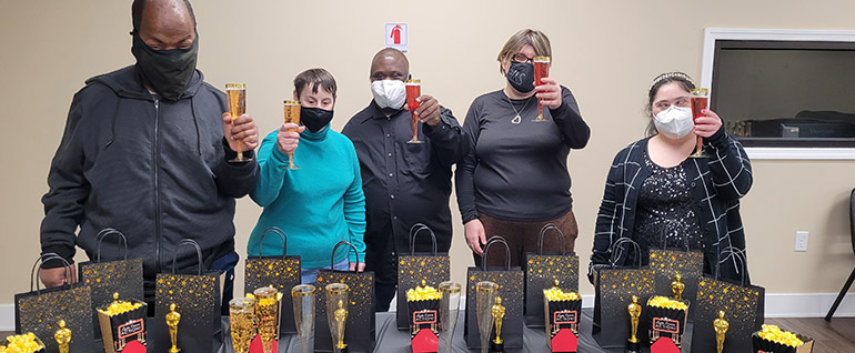 Arc recreation consumers enjoying an Oscars party with popcorn and drinks