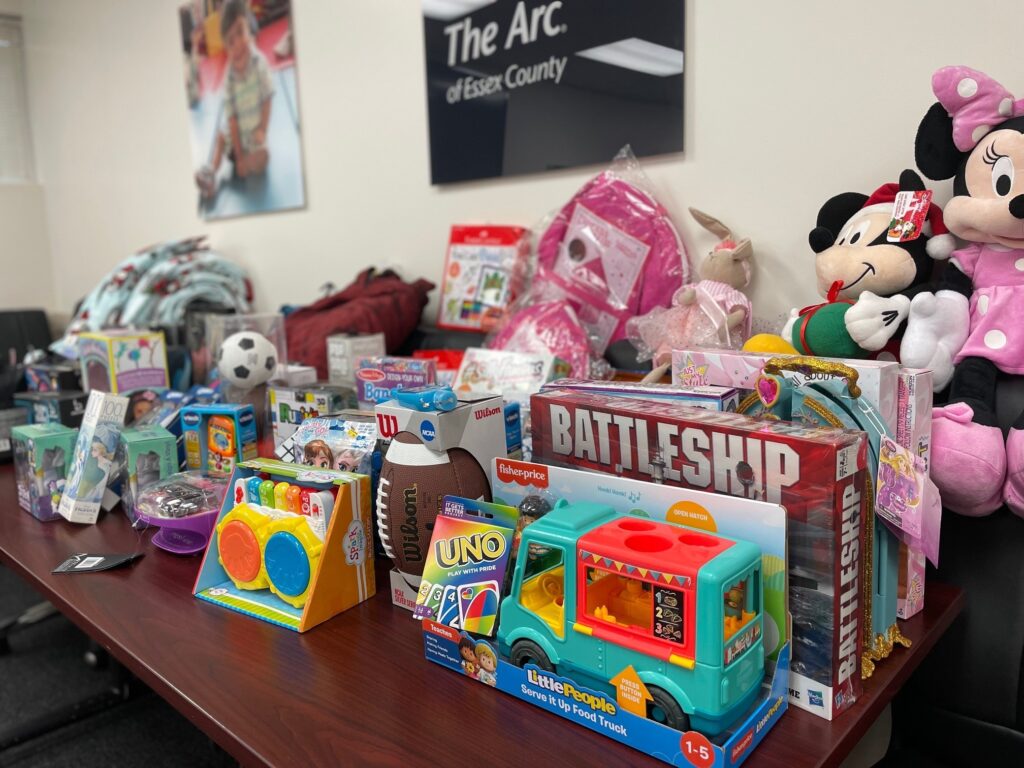 A collection of toys and games on a table.