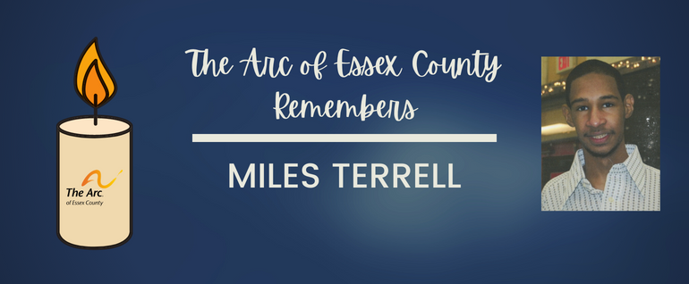A candle with The Arc of Essex County logo. Text in the middle says" "The Arc of Essex County Remembers Miles Terrell." To the right, a photo of a man in a button-down shirt.