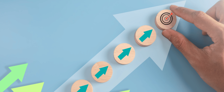 Arrows pointing up to a target, with a blue background.