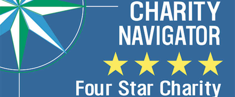 compass graphic with "Charity Navigator Four Star Charity" and four yellow stars on blue background