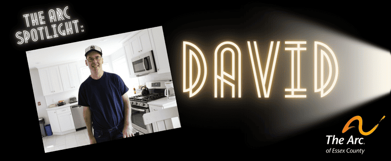 Dark background with a photo of a man standing in a kitchen. Above the photo are the words 