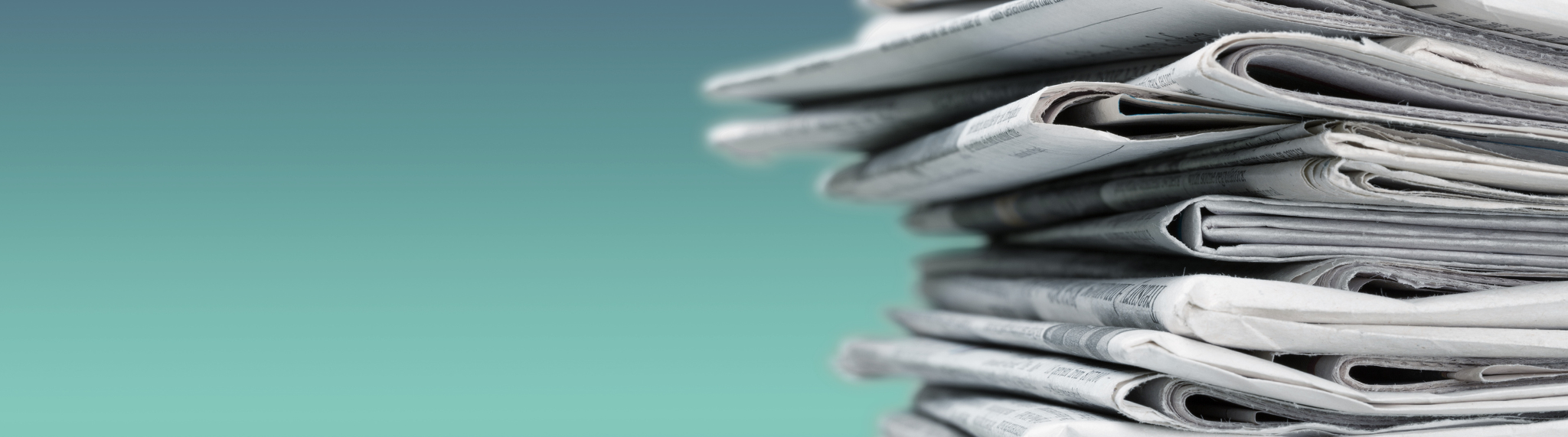 Green background, with a stack of newspapers on the right side of the image.